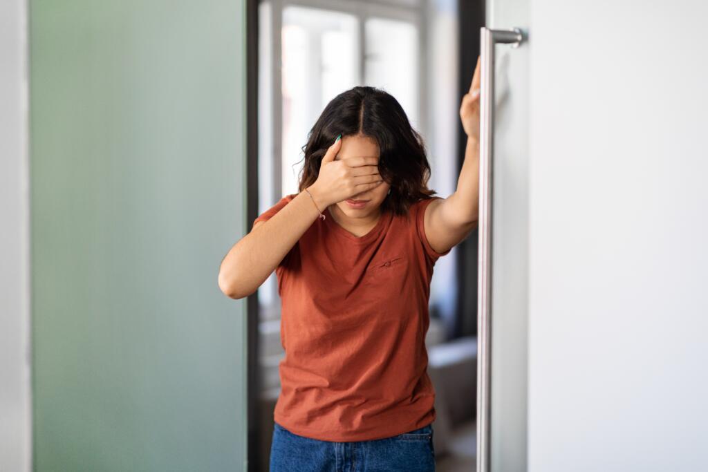 Dizziness,Concept.,Dizzy,Young,Arab,Woman,Suffering,Vertigo,Attack,At - Gardner Physical Therapy Woman experiencing dizziness and vertigo, a common condition treated with vestibular rehabilitation at Gardner Physical Therapy