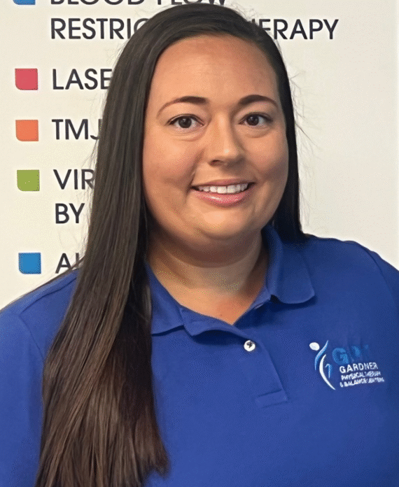 Sarah Grant, PTA at Gardner Physical Therapy, smiling in a clinic setting, passionate about balance and mobility rehab.