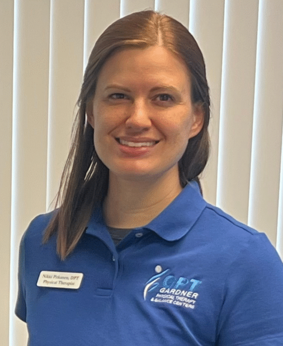 Nicole Pitkanen, PT, DPT at Gardner Physical Therapy, balance and pelvic floor specialist, smiling in a clinical setting.