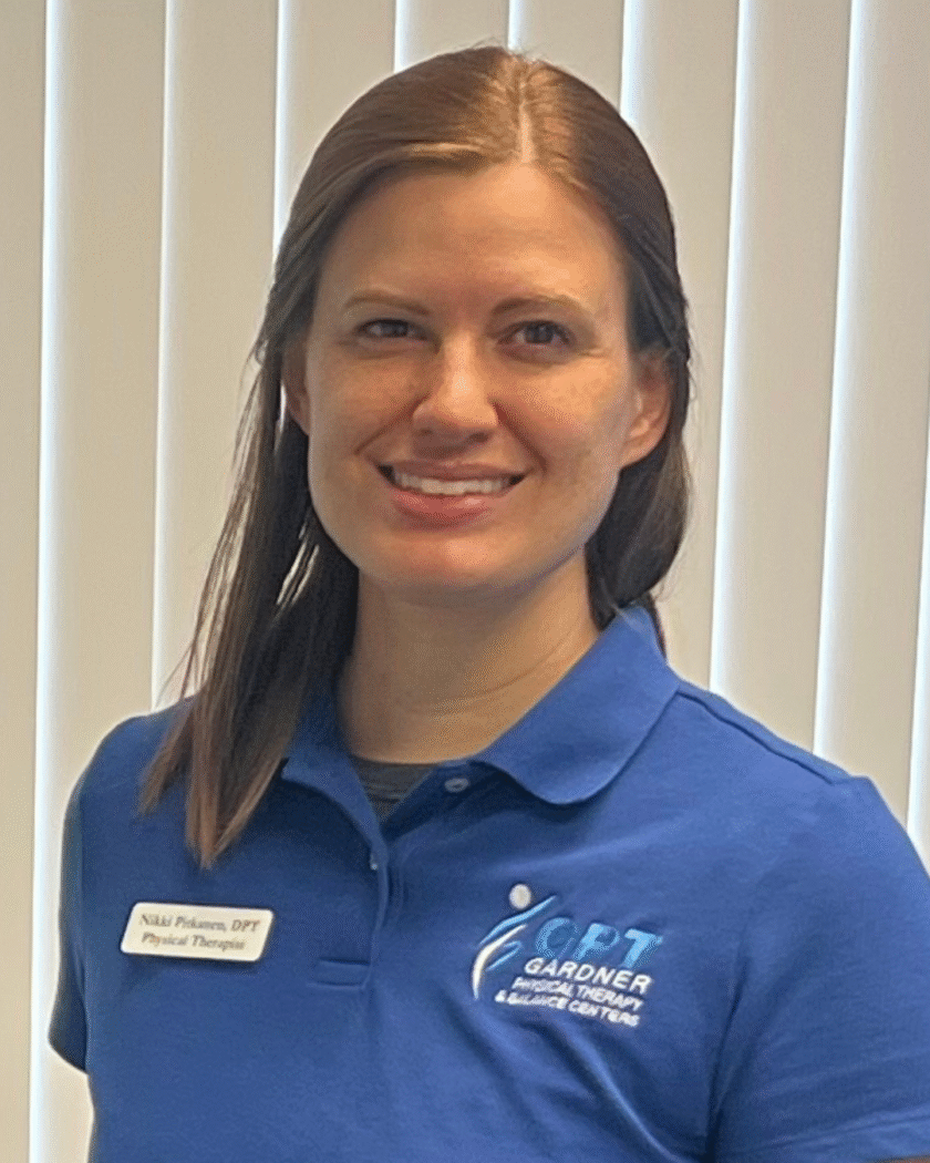 Nicole Pitkanen, PT, DPT at Gardner Physical Therapy, balance and pelvic floor specialist, smiling in a clinical setting.